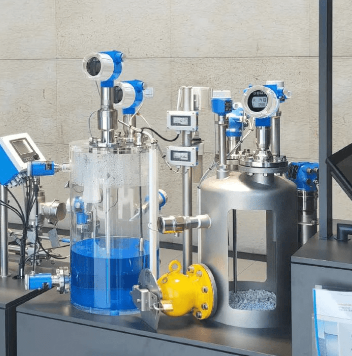 Tuning fork level switch installed on an industrial chemical reactor vessel with flange mounting